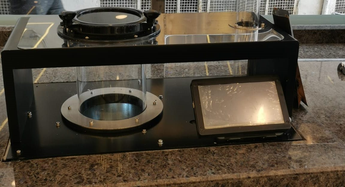 Counter-top control station with touchscreen and a clear dosing chamber