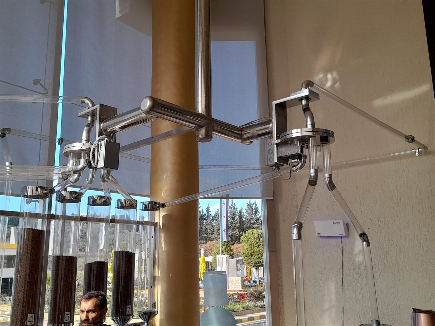 Wide view of the Coffee Land counter and pipe network